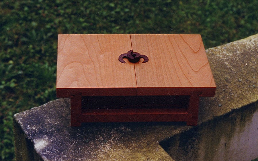 solid cherry and walnut custom wedding box "ES" by yana frank, seen from top at an angle